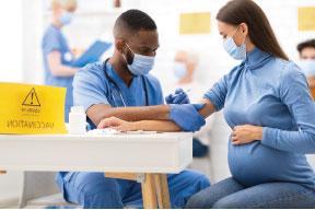 pregnant woman getting vaccinated